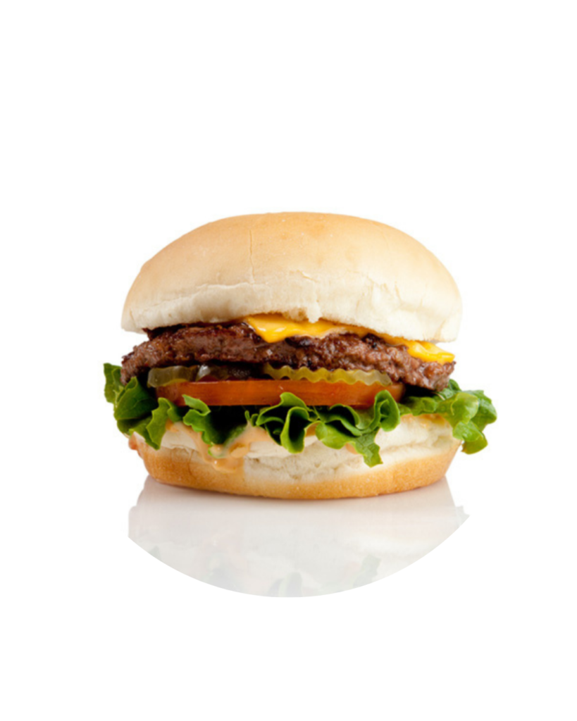 Beef hamburger with melted cheese lettuce tomato and pickles in a soft bun on a white background