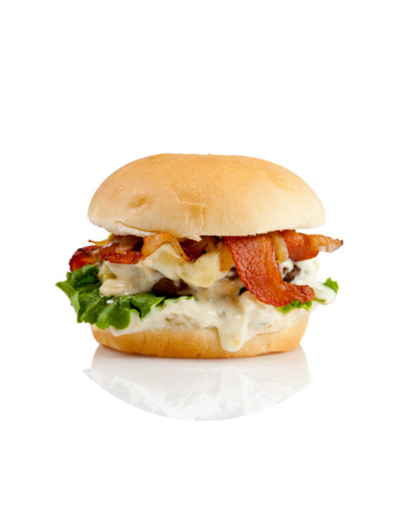 Bacon cheeseburger with melted cheese lettuce and a creamy sauce in a soft bun