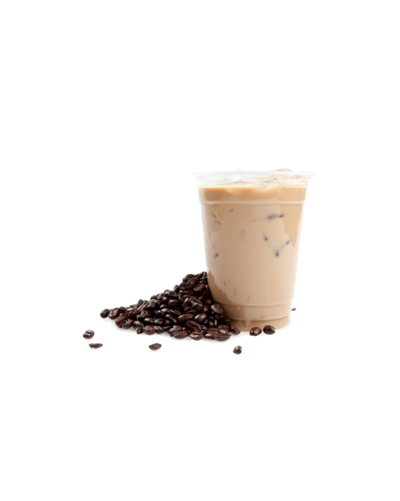 Iced coffee in a clear cup with ice surrounded by roasted coffee beans on a white background