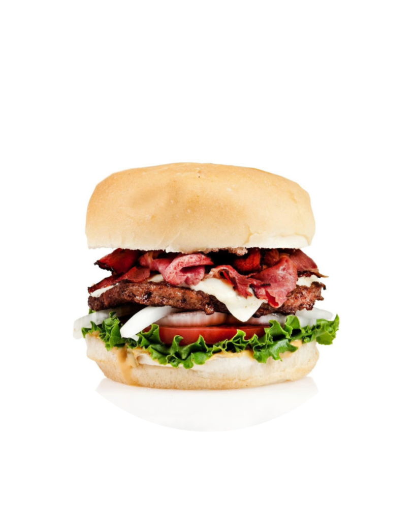 Hamburger with beef patty crispy bacon cheese lettuce tomato and onion on a soft bun against a white background