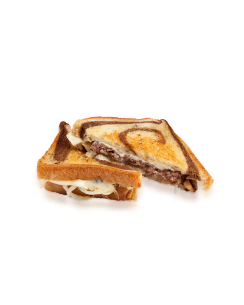 Cross section of a toasted sandwich with melted cheese and sliced meat filling cut in half on a white background