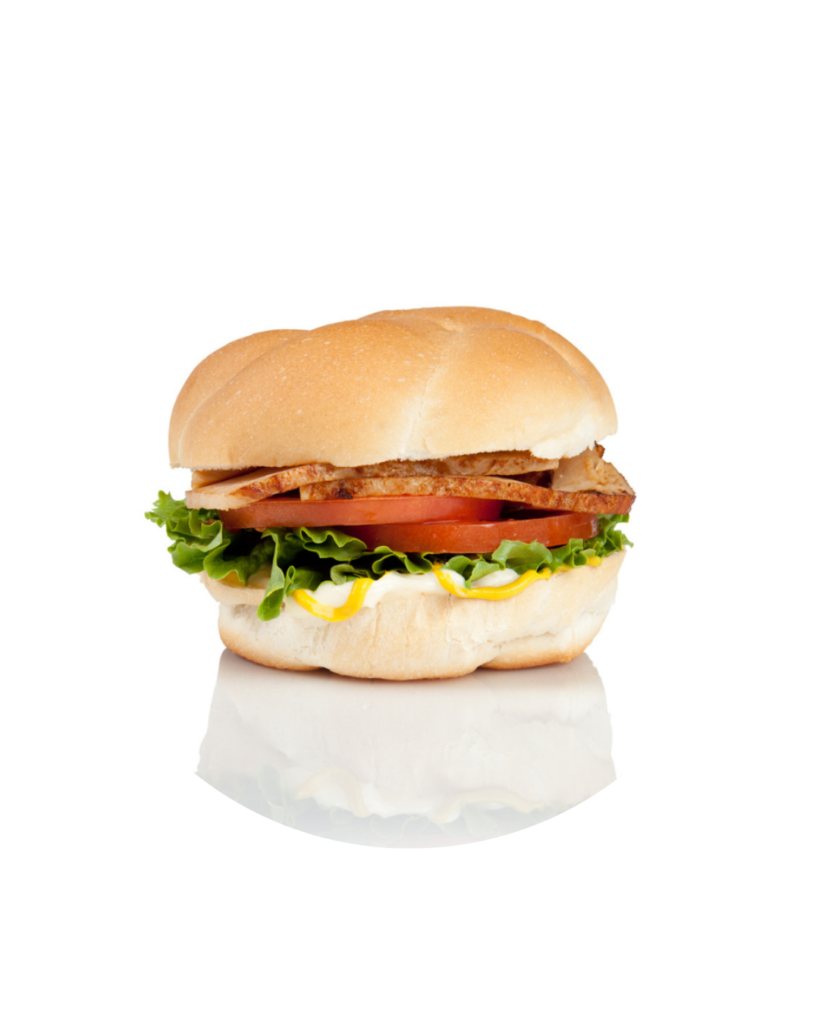 Hamburger with lettuce tomato and grilled chicken on a soft bun