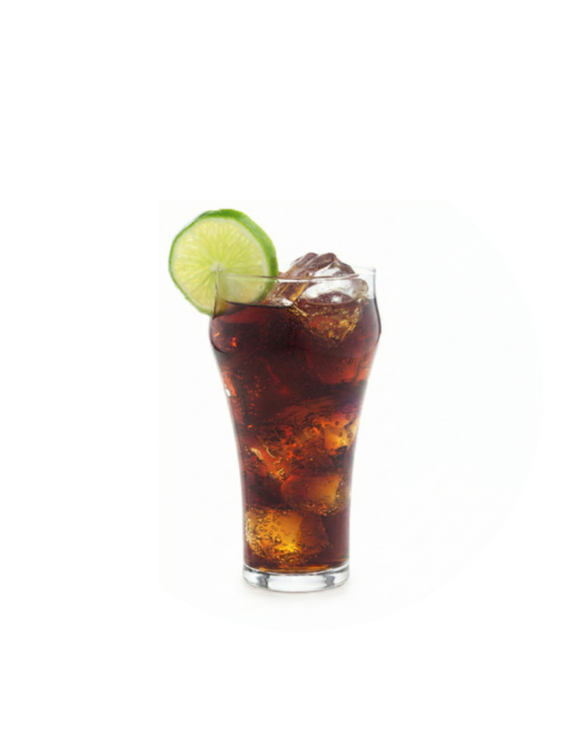 Tall glass of cola with ice and a lime wedge on the rim