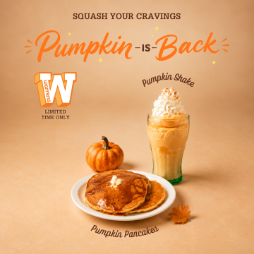 Pumpkin Pancakes with whipped cream on a plate, surrounded by pumpkins and a caramel drink on an autumn-themed backdrop.
